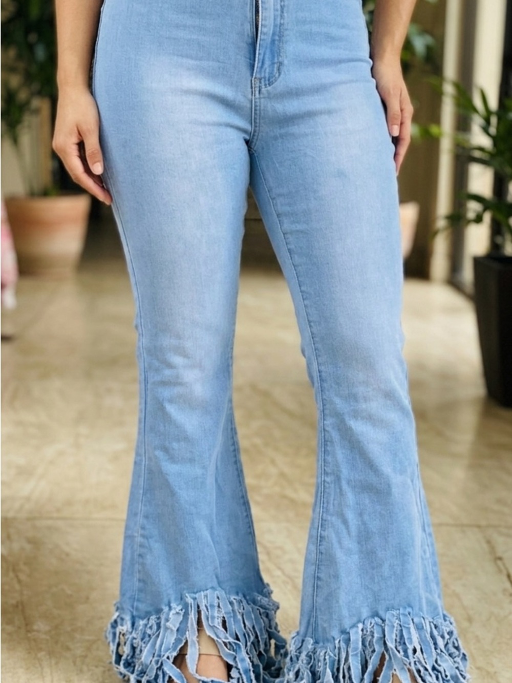 Fringed Hem Light Blue High-Rise Flare Jeans